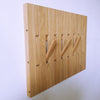 Wall-mounted organizer. plywood oak.