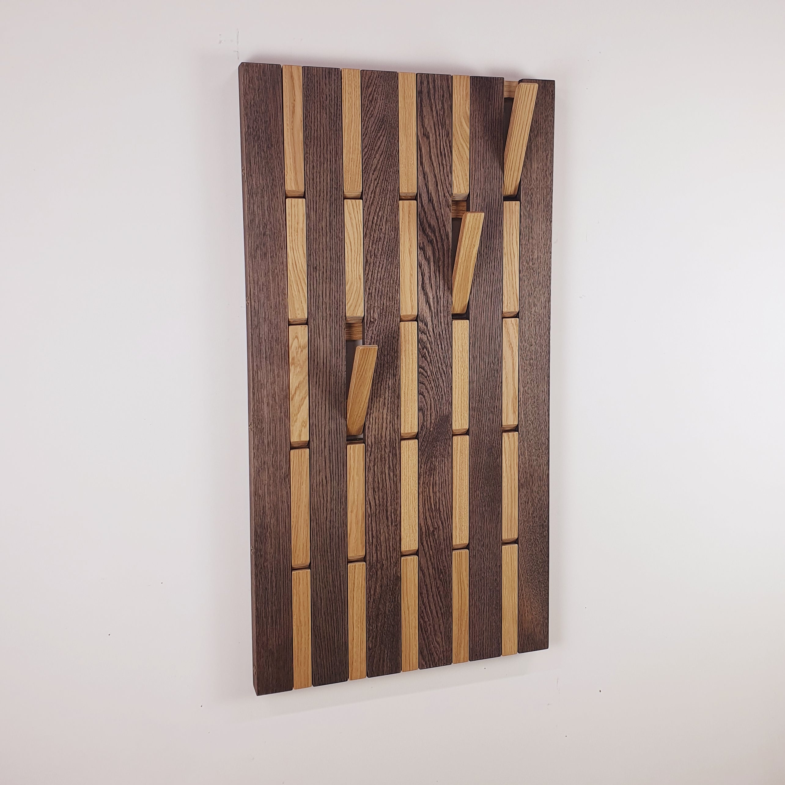 Wall-mounted organizer. plywood oak. dark and natural