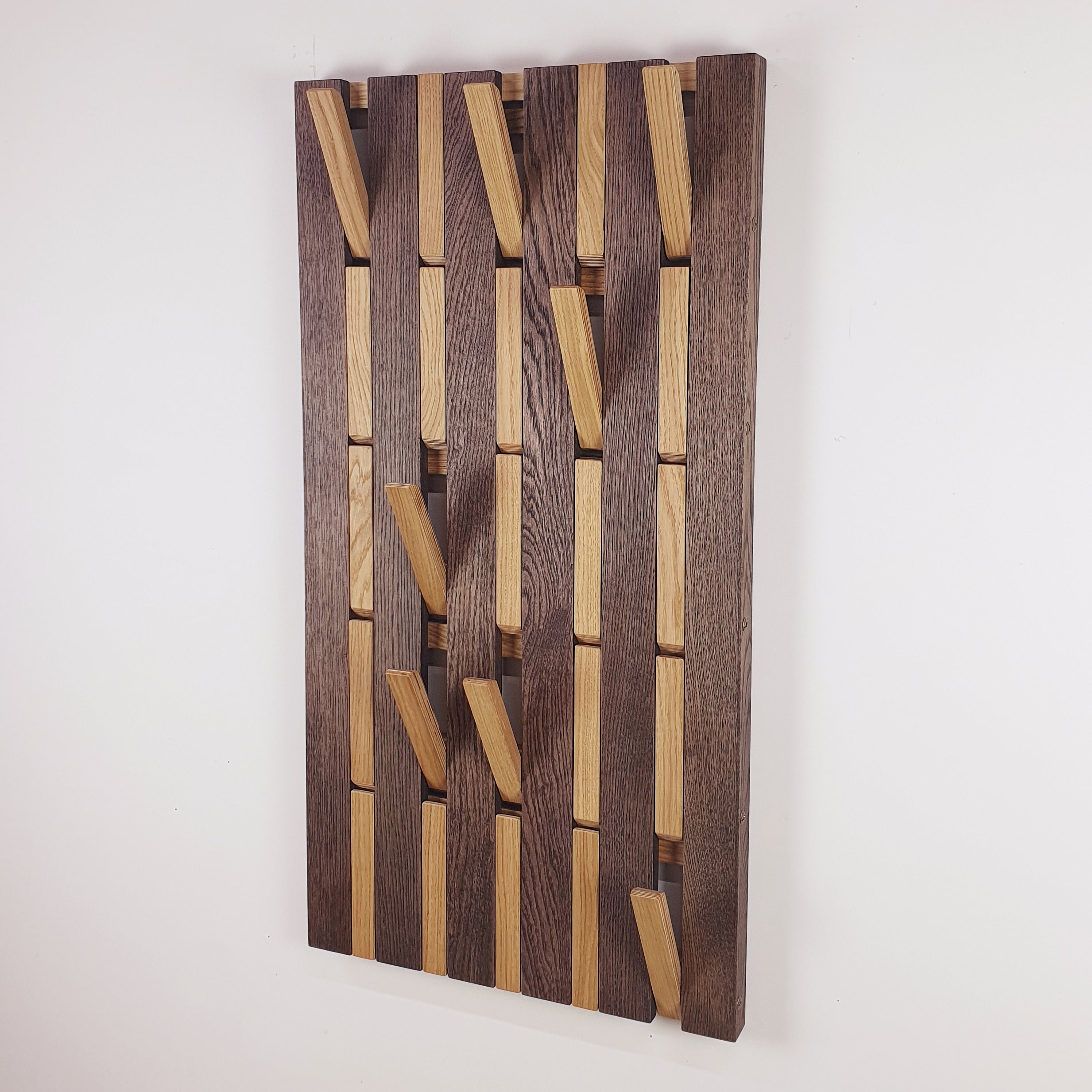 Wall-mounted organizer. plywood oak. dark and natural