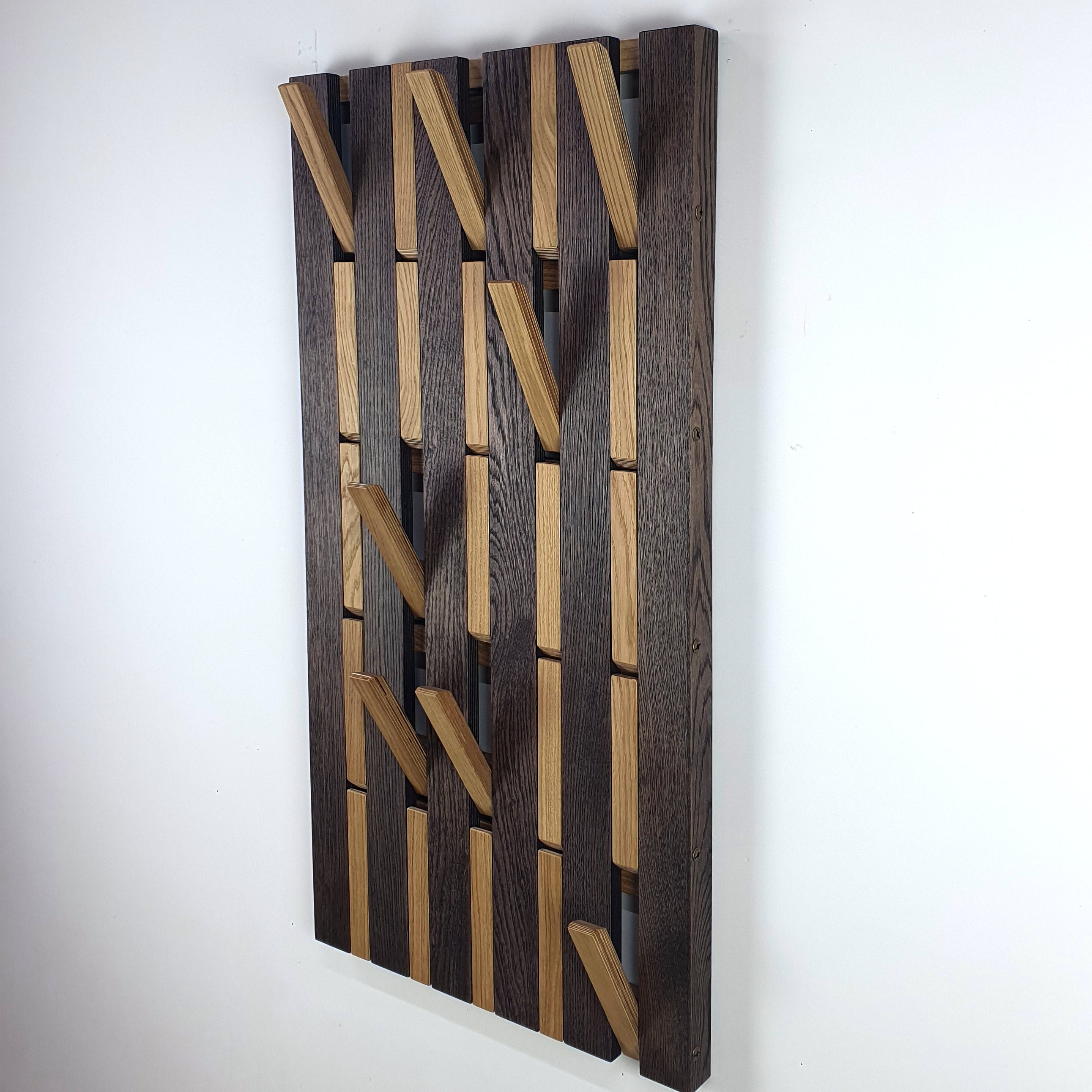 Wall-mounted organizer. plywood oak. dark and natural