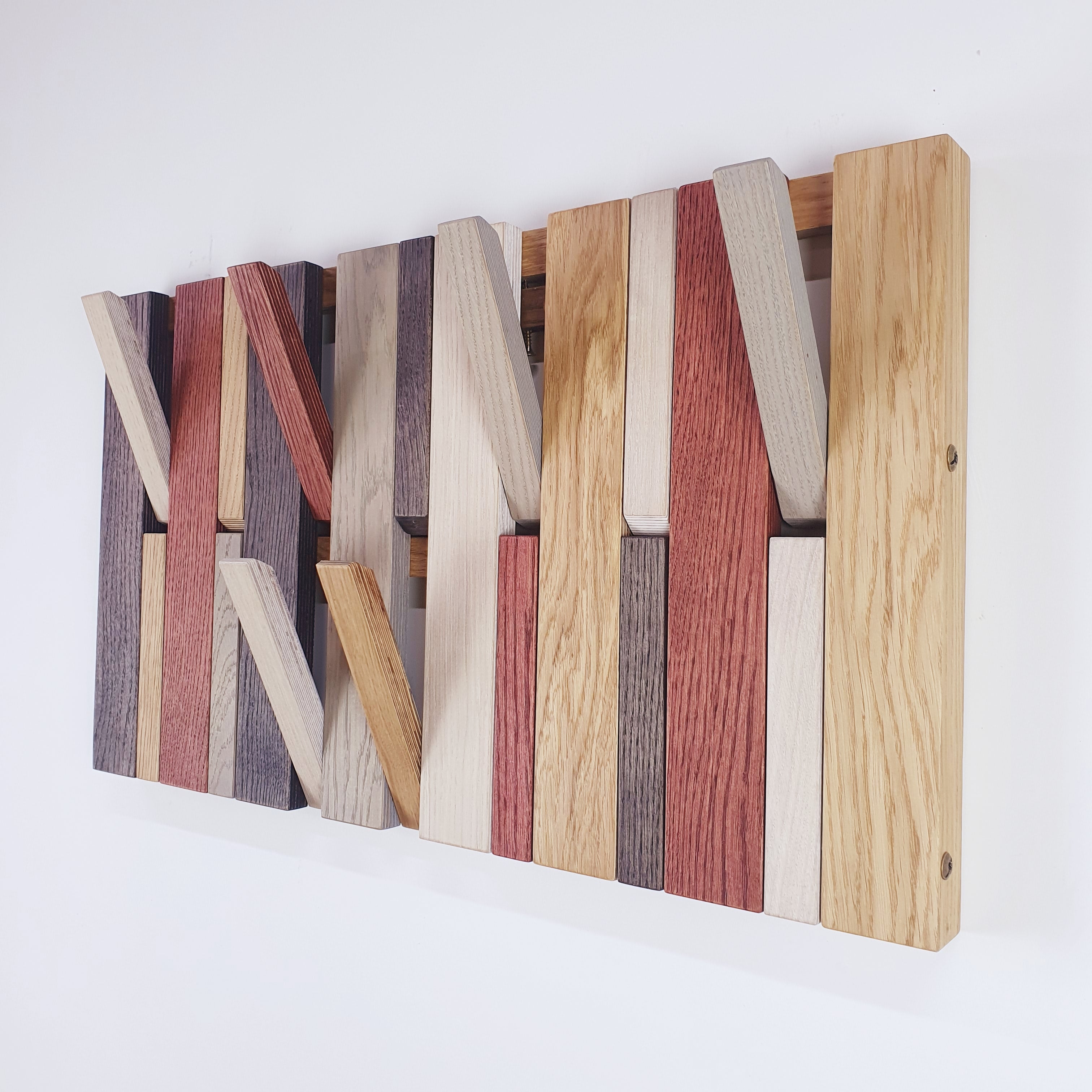 Wall-mounted organizer. plywood oak. multicolored