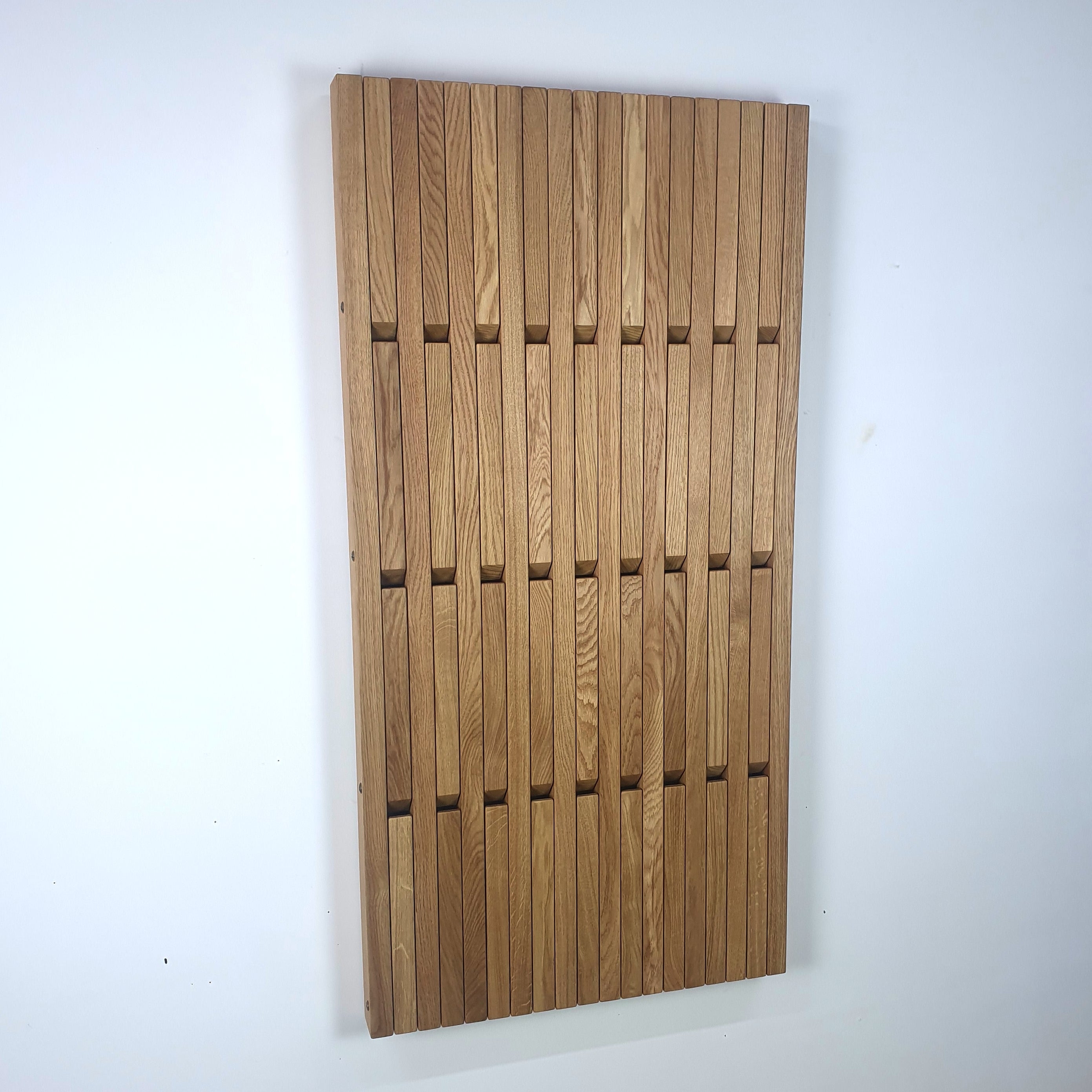 Wall-mounted organizer. natural oak