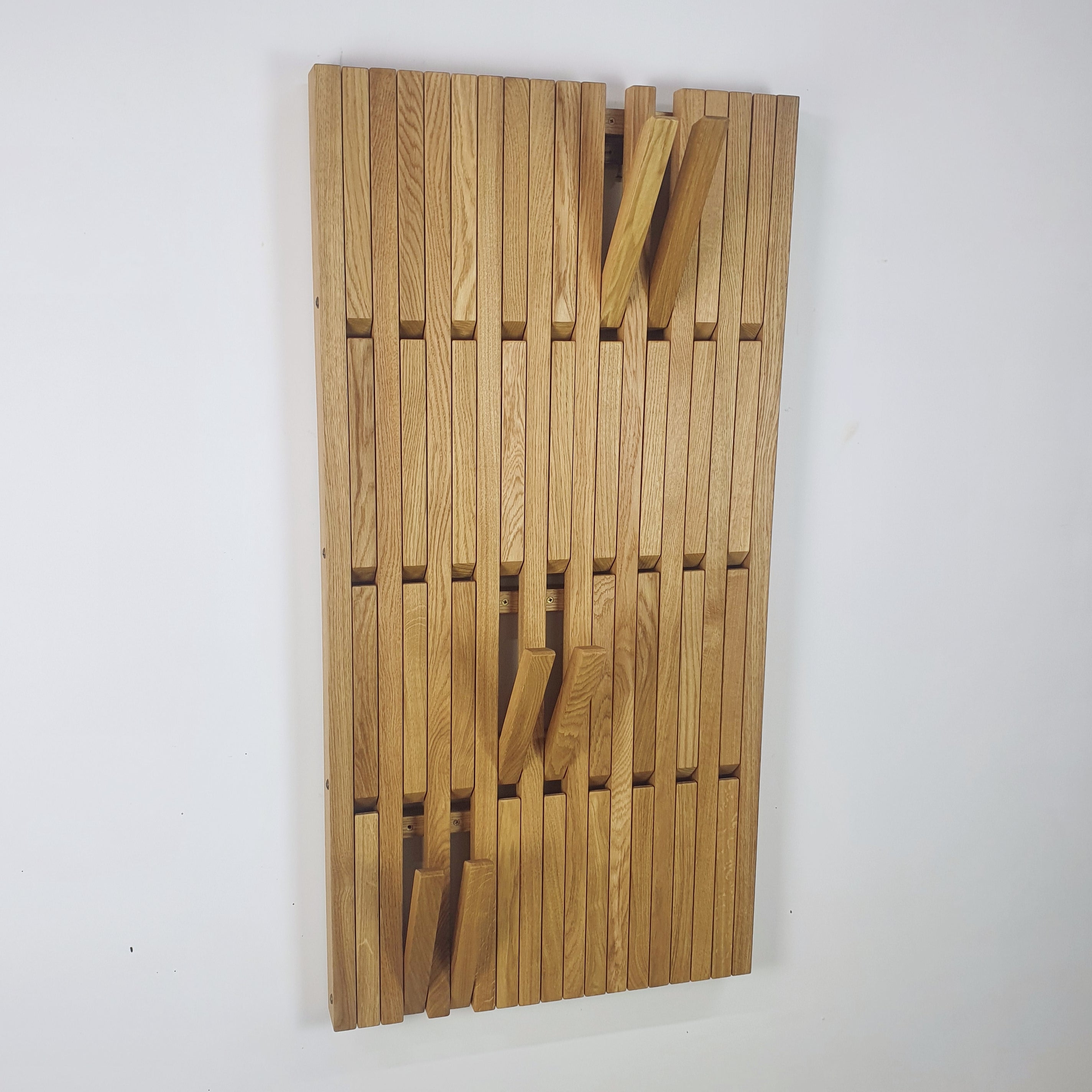 Wall-mounted organizer. natural oak