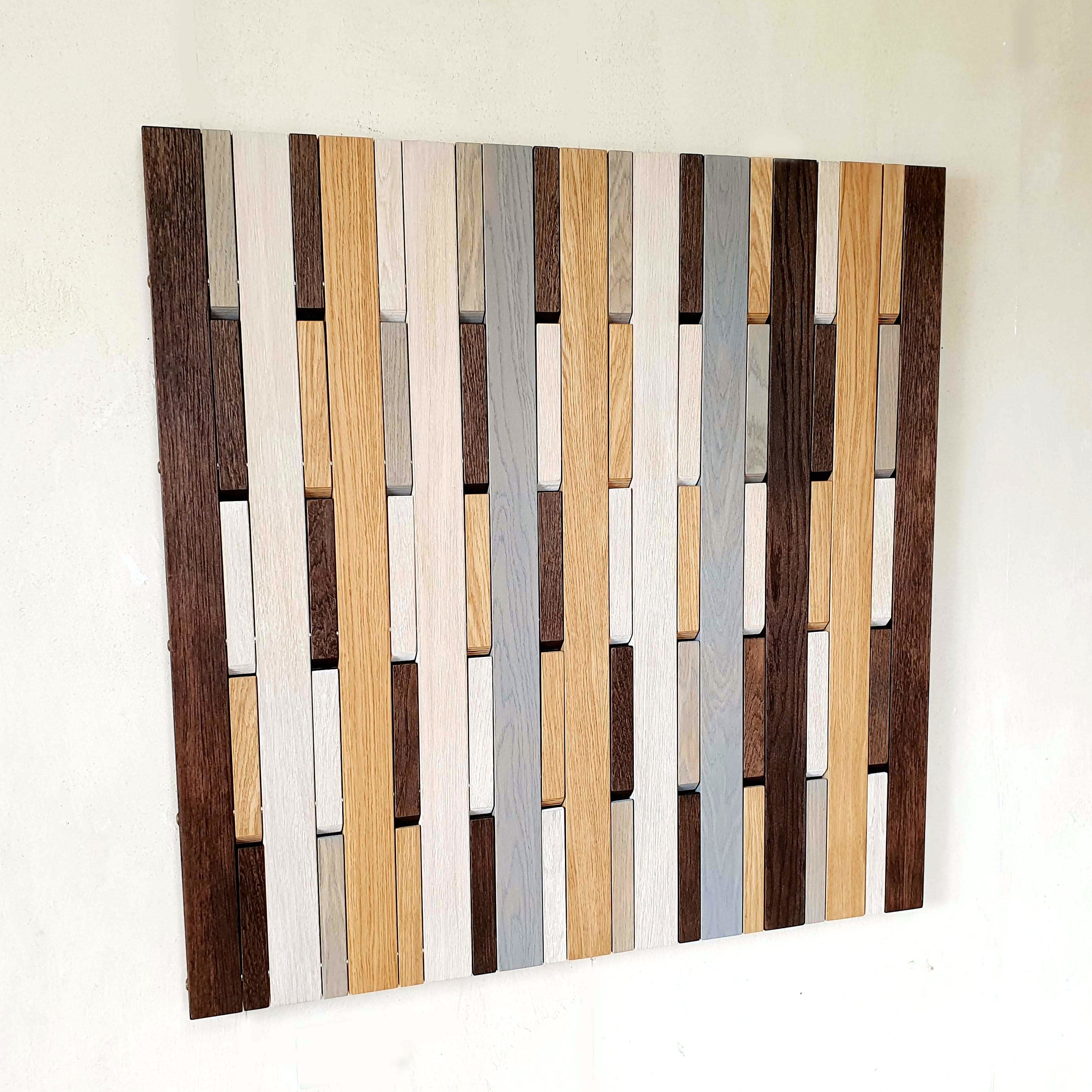 Wall-mounted organizer. plywood oak. Colored.
