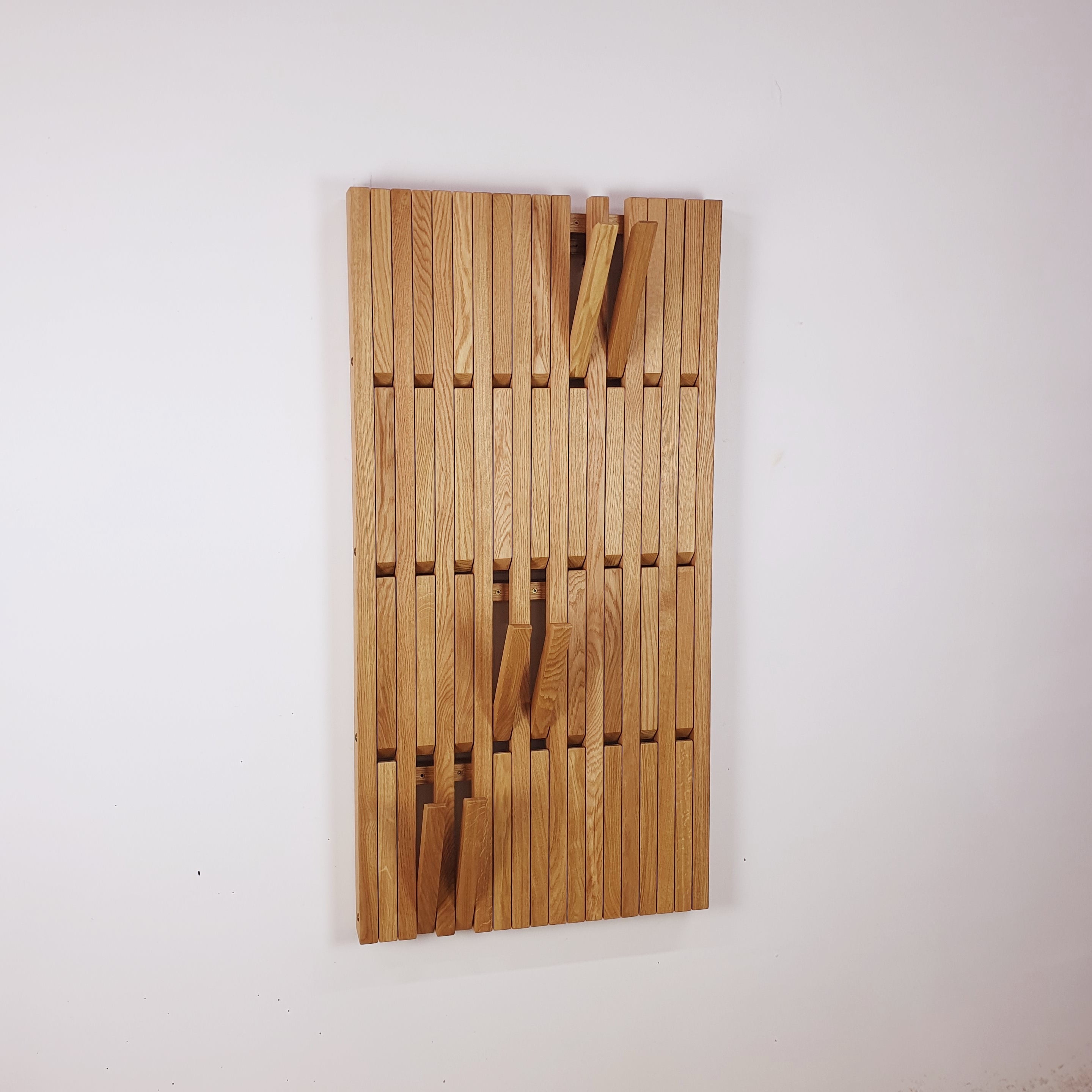 Wall-mounted organizer. natural oak