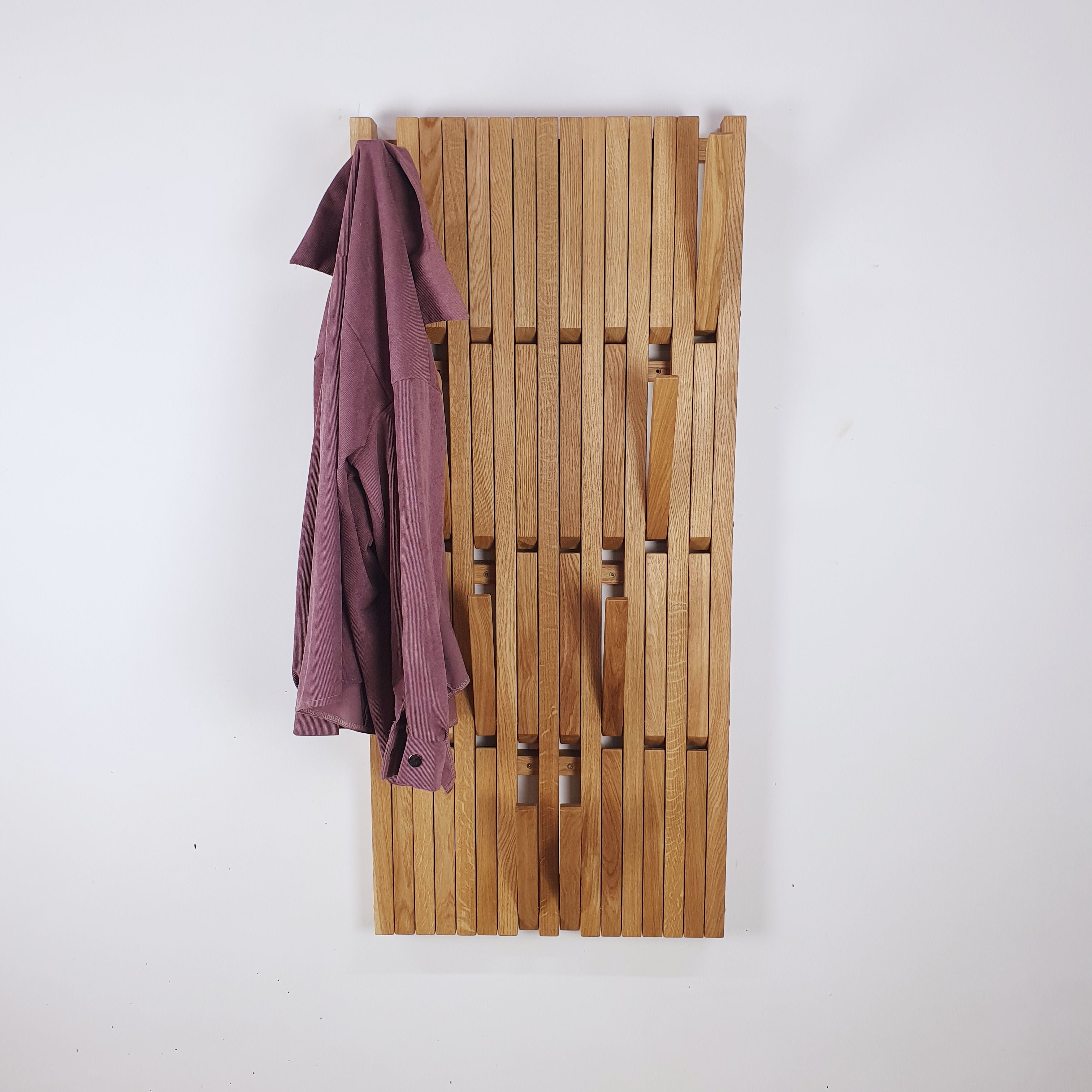 Wall-mounted organizer. natural oak