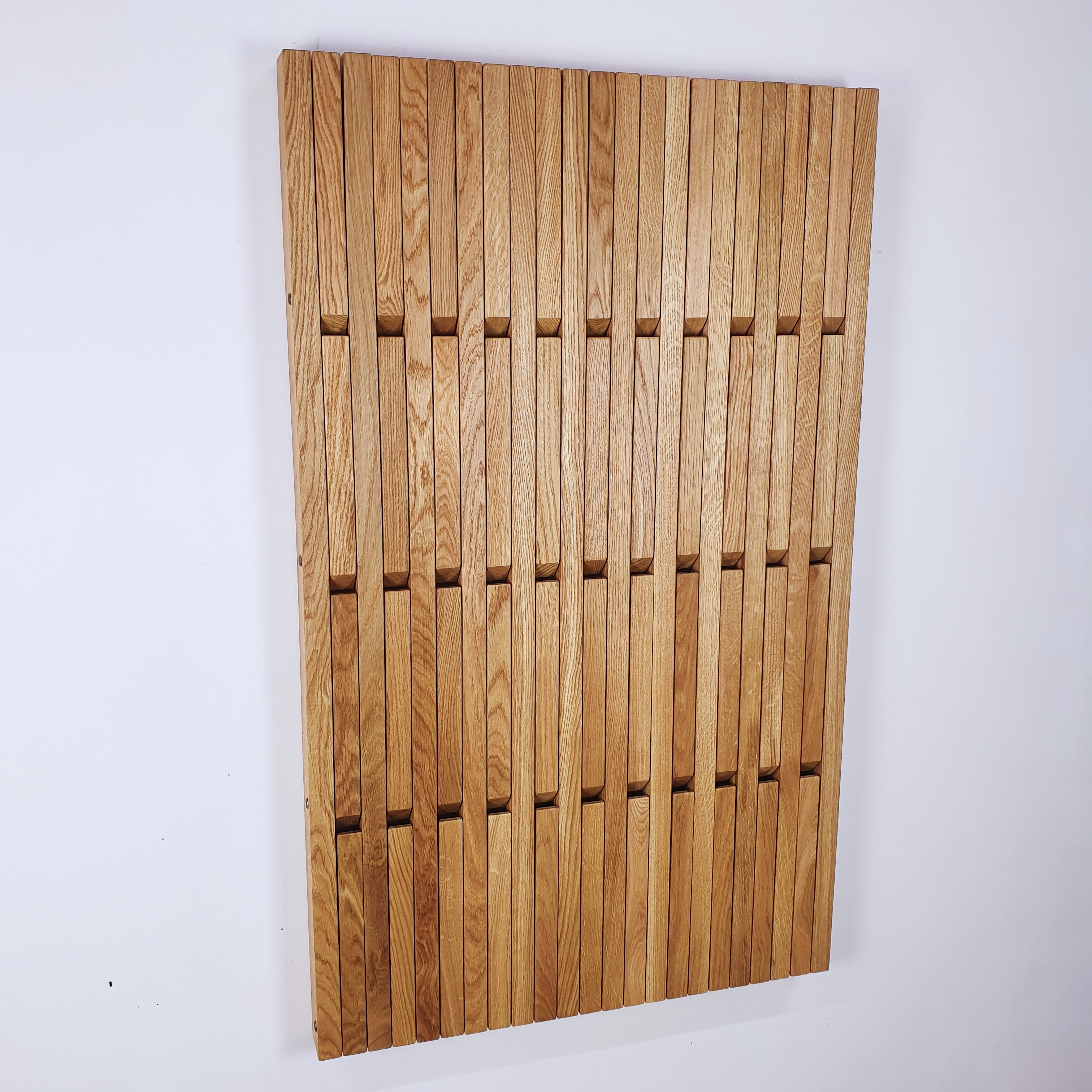 Wall-mounted organizer. natural oak