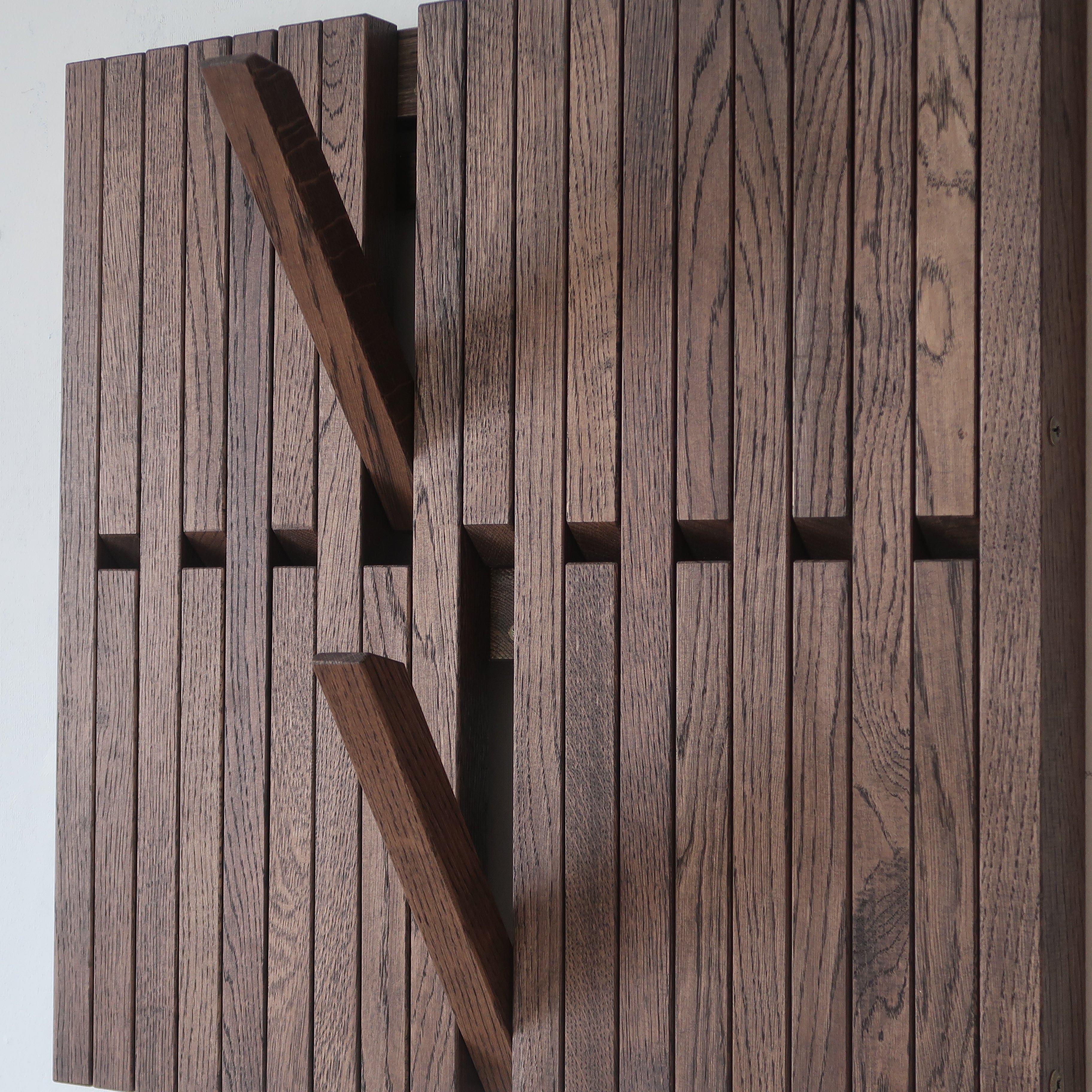 Wall-mounted organizer. dark natural oak