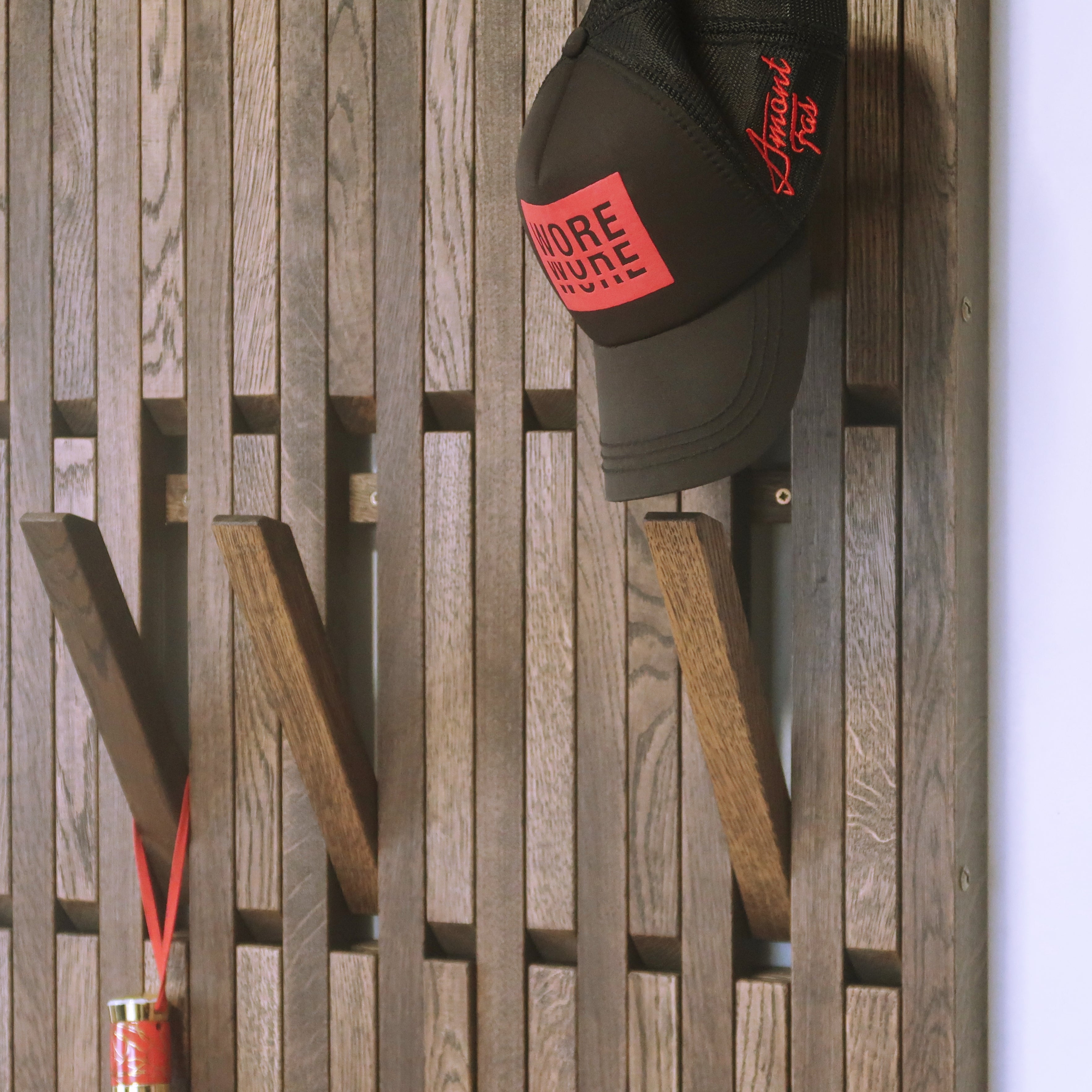 Wall-mounted organizer. dark natural oak