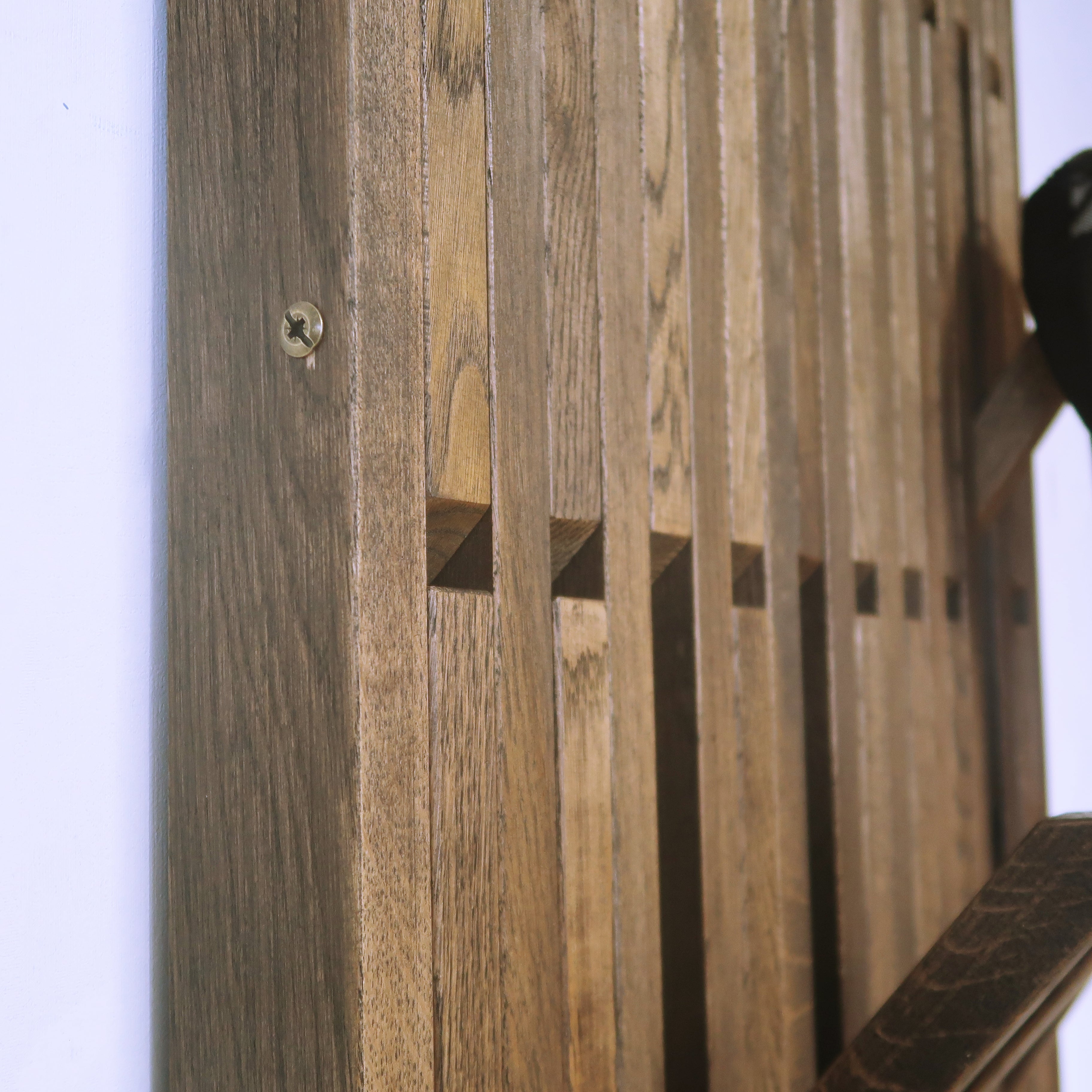 Wall-mounted organizer. dark natural oak