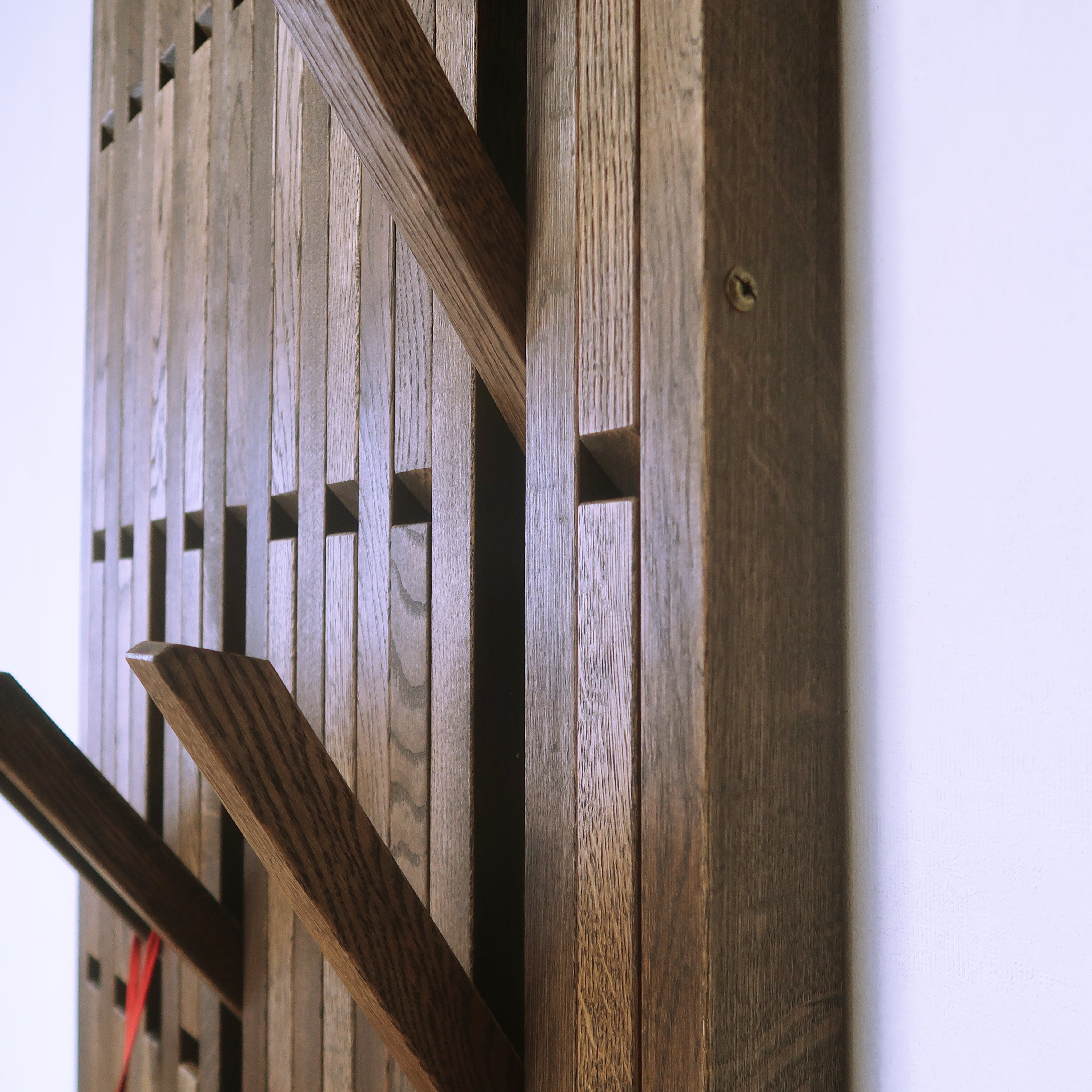 Wall-mounted organizer. dark natural oak