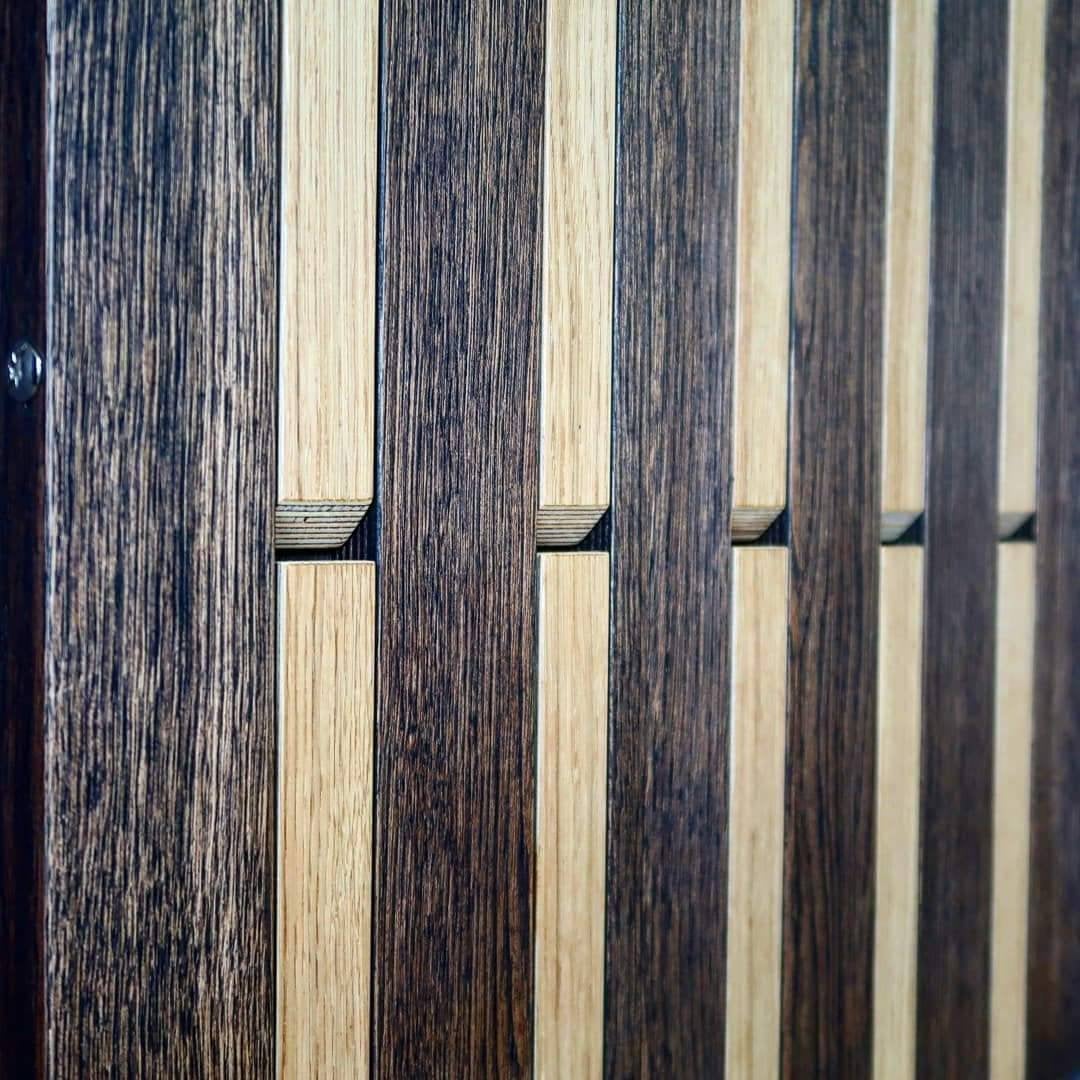 Wall-mounted organizer. plywood oak. dark and natural